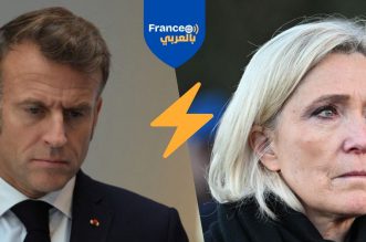 في أروقة الجمعية الوطنية.. تصويت غامض يُنقذ ماكرون من العزل بفضل حزب مارين لوبان